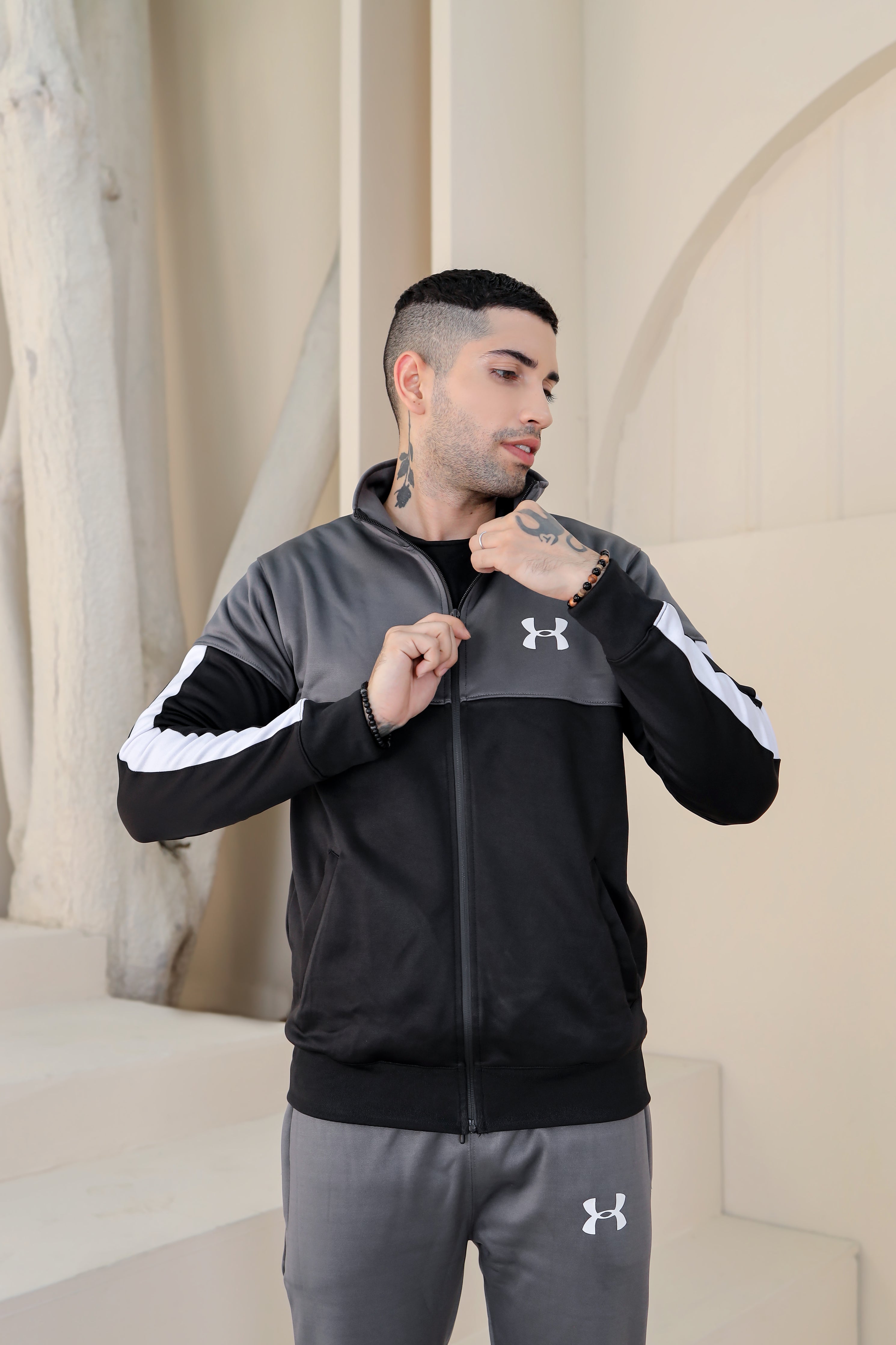 Under armour best sale the rock tracksuit